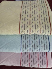 庫(kù)存加長(zhǎng)澡巾批發(fā)與一等品提花澡巾尾貨促銷 地?cái)偀徜N的毛巾便宜批發(fā)指南